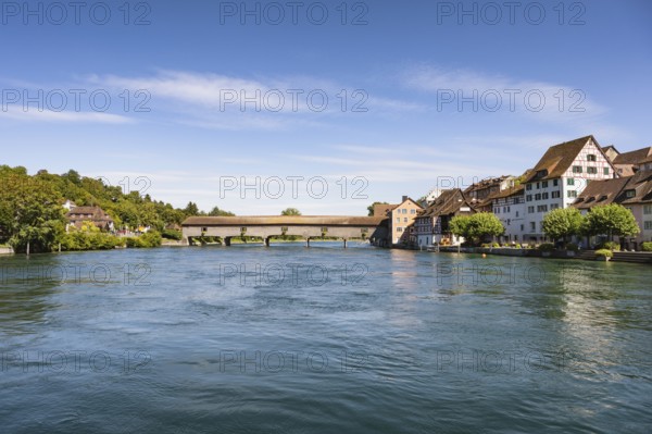 The historic wooden bridge over the Rhine was opened in 1816 and connects the German municipality
