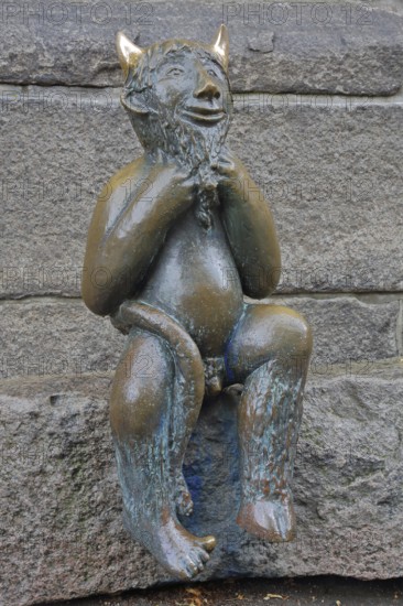 Sculpture Devil by Rolf Goerler 1999 sitting on the Devil's Stone, bronze sculpture, modern art, St
