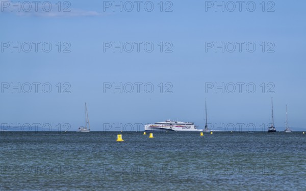 Boats on sea over Knoll Beach Studland, Poole, Dorset, England, United Kingdom