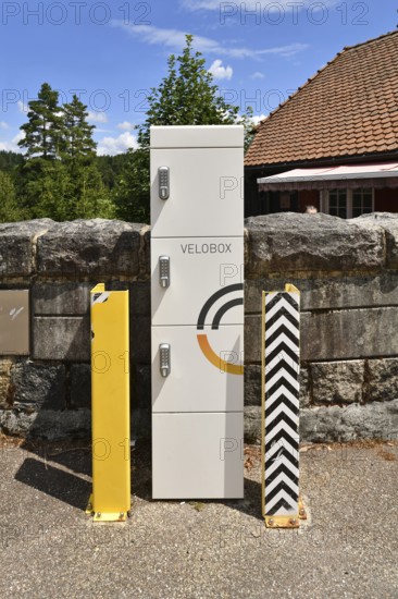 Forbach, Germany - July 12th 2025: Modern Velobox e-bike charging station with secure lockers