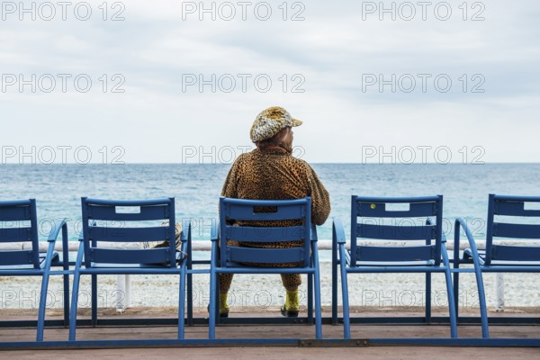 Woman on the promenade, Nice, Alpes Maritimes, Provence Alpes Cote d'Azur, French Riviera, South of