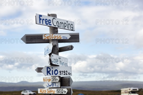 Signposts, signs, free camping, free WIFI, distance to Selfoss, Cape Town, Rio and Alice Springs,