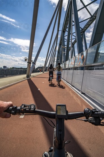 Ride over the Snelbinder Brug bicycle and pedestrian bridge, over the river Waal near Nijmegen, was
