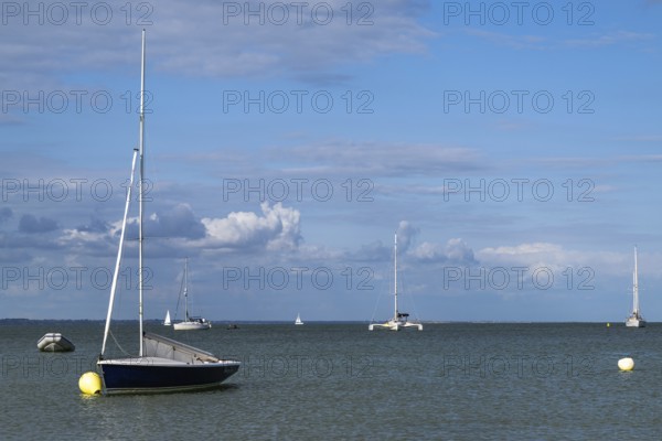 Boats on sea over Knoll Beach Studland, Poole, Dorset, England, United Kingdom