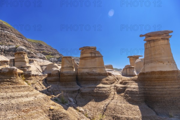 Breathtaking view of the otherworldly hoodoo rock formations in drumheller, alberta, canada,