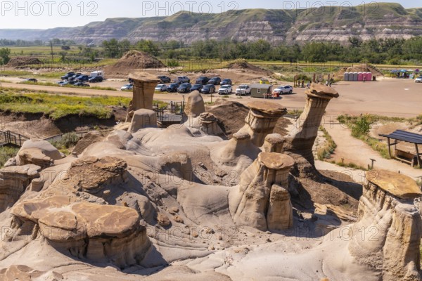 Breathtaking panorama featuring unique hoodoo rock formations in drumheller valley, highlighting