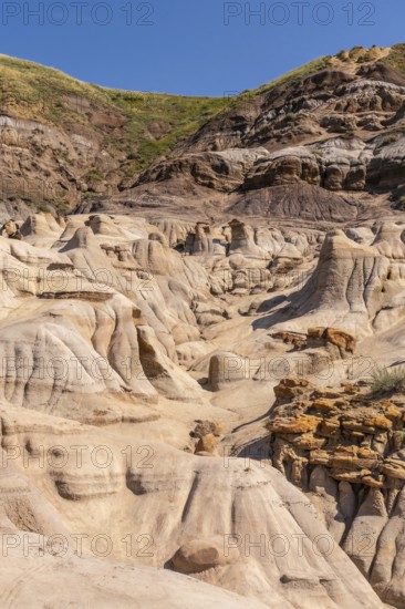 Breathtaking view of the arid landscape featuring unique hoodoo rock formations rising from the