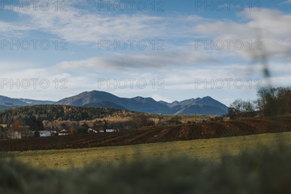 Extensive landscape with mountains in the background under clear blue sky, Ternitz, Lower Austria,
