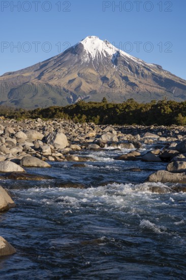 Mount Taranaki, in the foreground Stony River (Hangatahua River) . Egmont National Park, Taranaki