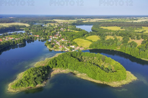 Aerial view, drone photo: Carwitz village and GÃ¤nsewerder island on Lake Carwitz behind the lake