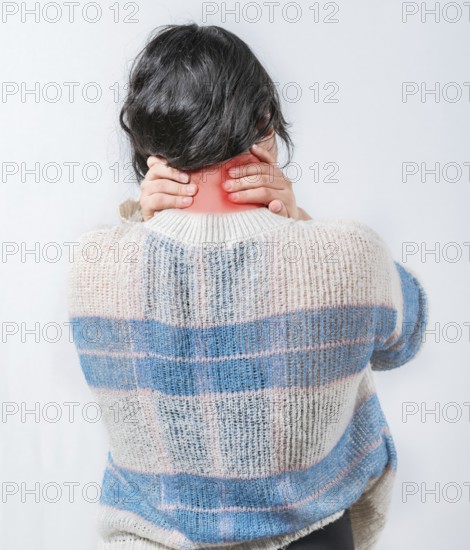 Close up female with neck pain. Woman in pain holding her neck isolated. Suffering woman with