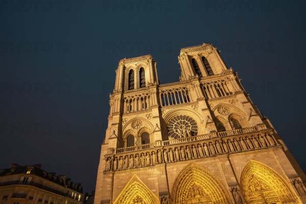 Notre dame de paris cathedral showcasing its historic gothic architecture and intricate details,