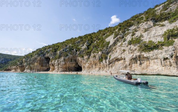 Turquoise clear water and picturesque rocky coast, Cala Luna cliffs and beach, Golfo di Orosei,