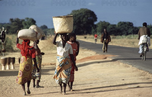 Women with payloads, Salima, Malawi, Africa, June 2000, vintage, retro, old, historic
