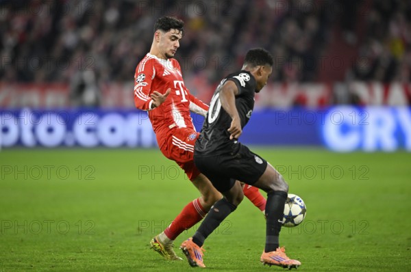 Duel, action Aleksandar Pavlovic FC Bayern Munich FCB (45) against Geny Catamo Sporting Lisbon SCP