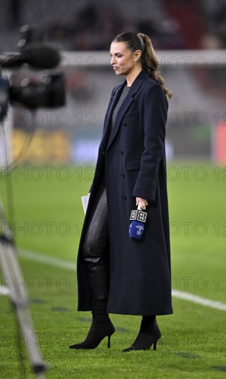 DAZN presenter Laura Wontorra with microphone, logo, Champions League, Allianz Arena, Munich,