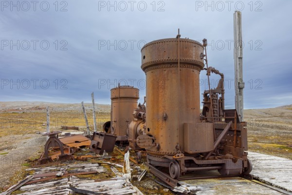 Steam engine at abandoned marble quarry Camp Mansfield, Ny London near Ny-Alesund,