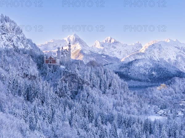 Picturesque picture of Neuschwanstein Castle nestled in a magnificent winter landscape with