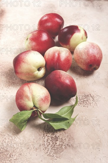 Nectarine scattered on the table, top view, close-up, no people