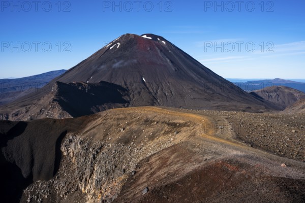 Mount Ngauruhoe and the Tongariro Alpine Crossing hiking trail in Tongariro National Park. North