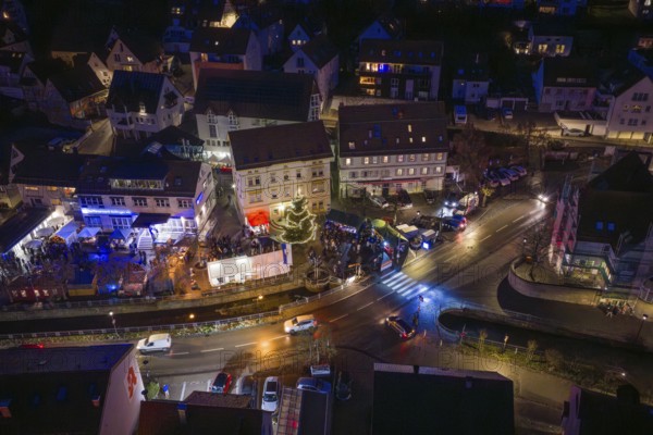 Night view of a lively village with illuminated road junctions, Aidlingen Christmas market,