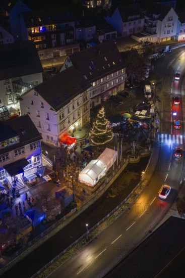 Illuminated street at night with Christmas tree and decorated buildings, Aidlingen Christmas