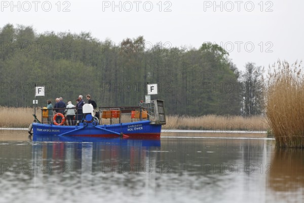 Passenger ferry on the Peene near Stolpe while translating, tourism, Peenetal nature park Park,