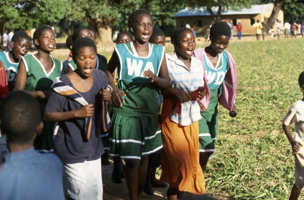 Exuberant woman at a village festival in Kande, Malawi, Africa, July 2000, vintage, retro, old,