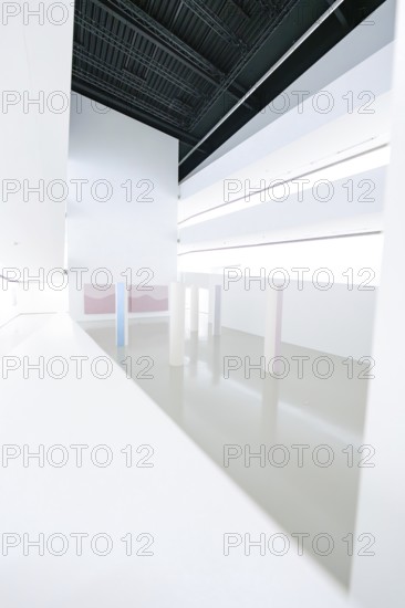 White room with various structural elements and minimal decor, Open Horizons exhibition, Schauwerk