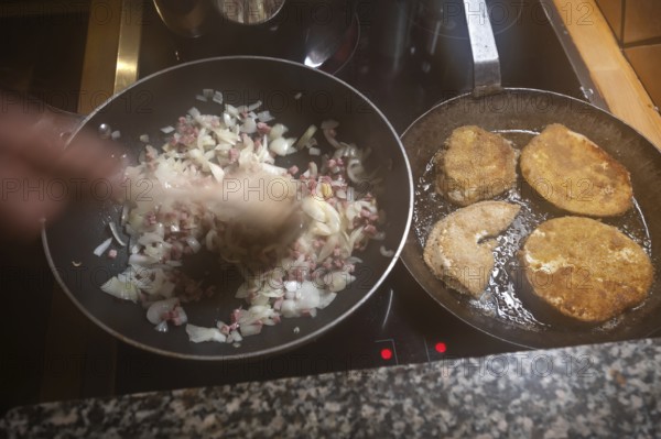 Preparation of breaded cutlets of giant bovista (Bovista) in the pan, Mecklenburg-Vorpommern,
