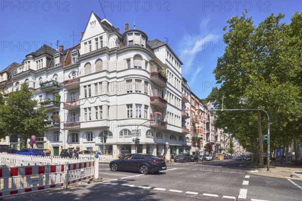 Historic residential buildings, general architecture, fenced construction site, barrier, road