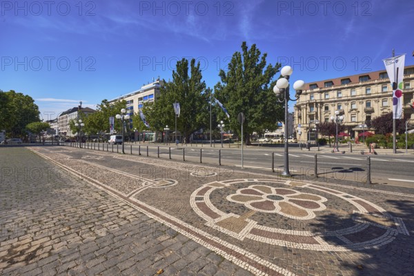 Sidewalk, paving stones, mosaic, pattern, barrier bollard, lantern, general architecture, trees,
