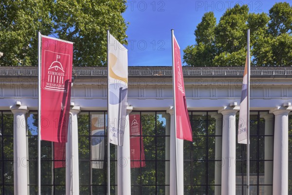 Spa hotel colonnades, colonnades, flags on flagpoles, spa hotel Wiesbaden, historic building,