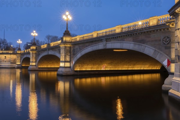 The Lombard Bridge on the Inner Alster and Outer Alster at Blue Hour with reflections in the water,