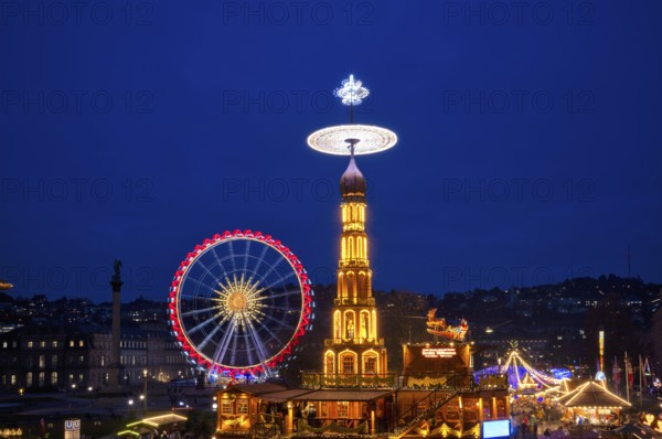 Night view, Christmas market with Christmas pyramid, Ferris wheel, movement effect, New Castle,