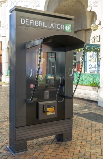 JCDecaux modern public access defibrillator station kiosk communication hub, town centre of
