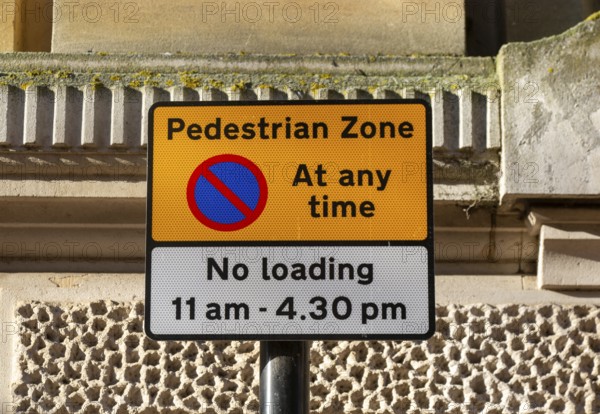 Pedestrian Zone access and loading restrictions sign in town centre of Ipswich, Suffolk, England,