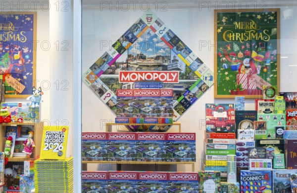 Monopoly and other board games in window display of Waterstones bookshop, Ipswich, Suffolk,