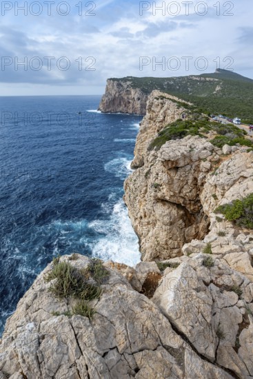 Steep cliffs by the sea, Belvedere Foradada, cliffs on the Capo Caccia headland, Alghero, Sardinia,