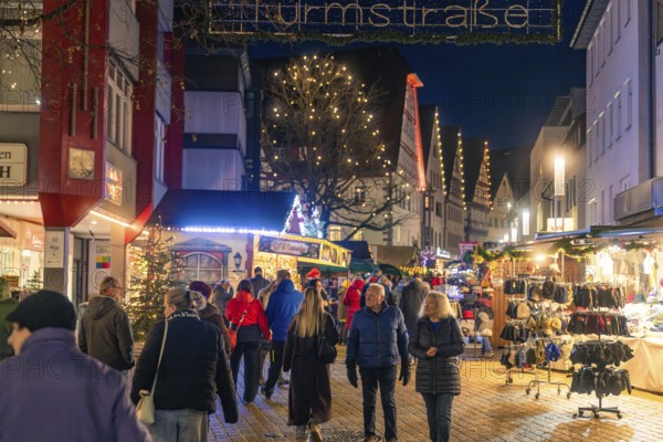 Operated Christmas market at night with festive street lighting, Christmas market 2025, Nagold,