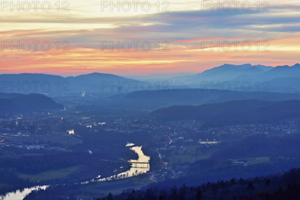 View of the Jura foothills from the Gisliflue, in the light of the setting sun, in the foreground
