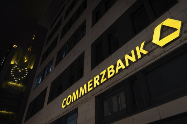 A yellow heart glows on the faÃ§ade of the Commerzbank Tower in Frankfurt am Main at Christmas time