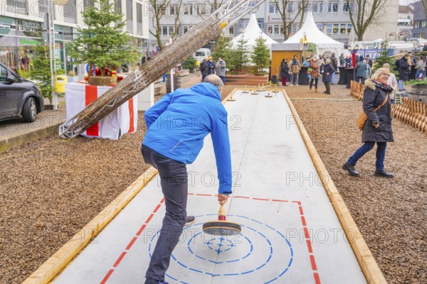 Curling competition with several people as spectators in the background, Sindelfingen, Böblingen