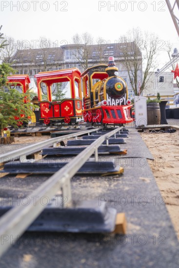 Toy train on rails creates cheerful atmosphere at Christmas market, Sindelfingen, Böblingen