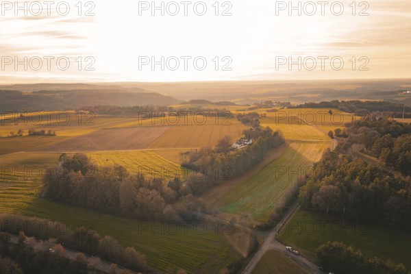 Extensive fields in soft sunset light with views of distant hills, Gechingen, Hecken and GÃ¤u