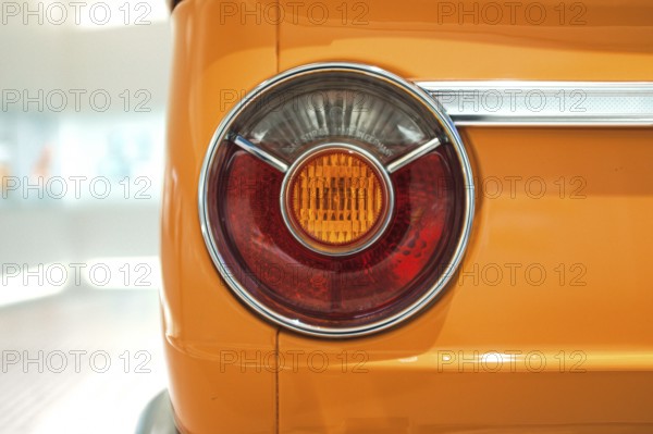 Detailed view, rear light of a BMW 2002 tii, BMW E10 series, also known as BMW 02 series. The round