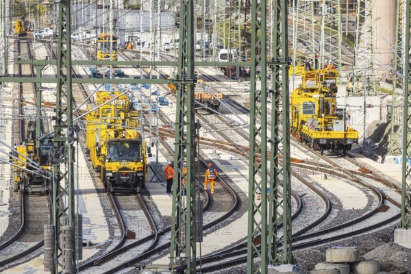 Rail construction crews with a work train. New parking station in UntertÃ¼rkheim. As part of