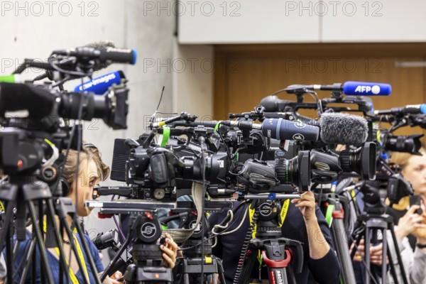 Cameras from various television stations are prepared for a press conference. Stuttgart,