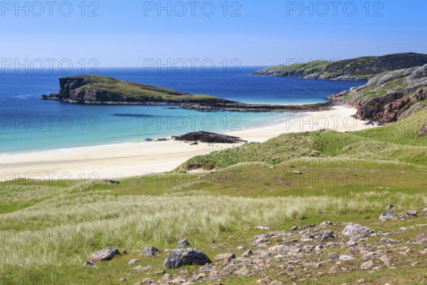 Dunes covered with beach oats line the idyllic sandy beach of Oldshoremore on the west coast of