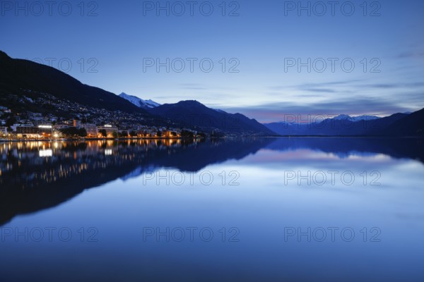 Locarno lake basin at dawn, snow-covered Pizzo Vogorno in the background, Canton of Tessin,